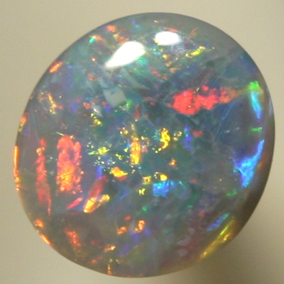 SOLID SEMI BLACK OPAL Sparkling red and orange contrasted by blue and green, all bright